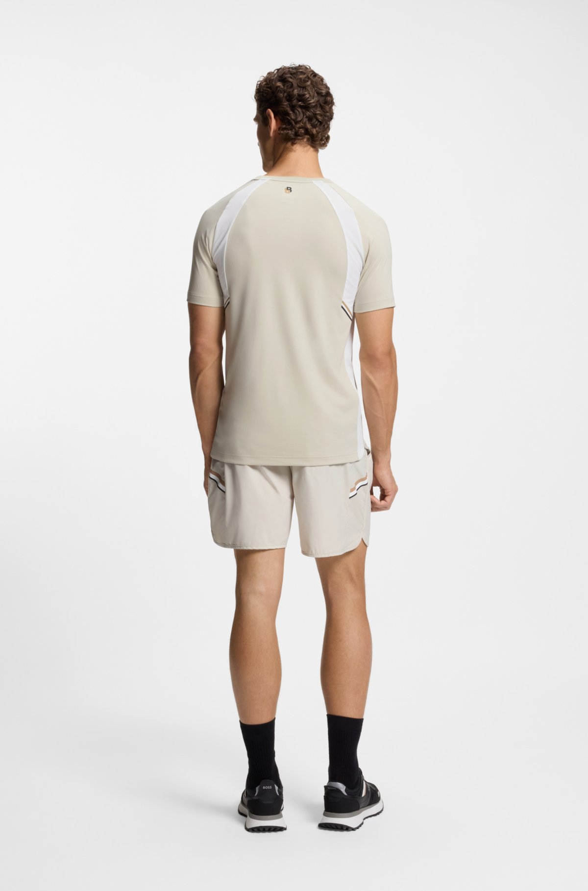 T-shirt attillato in tessuto rapida asciugatura con elasticità quattro direzioni