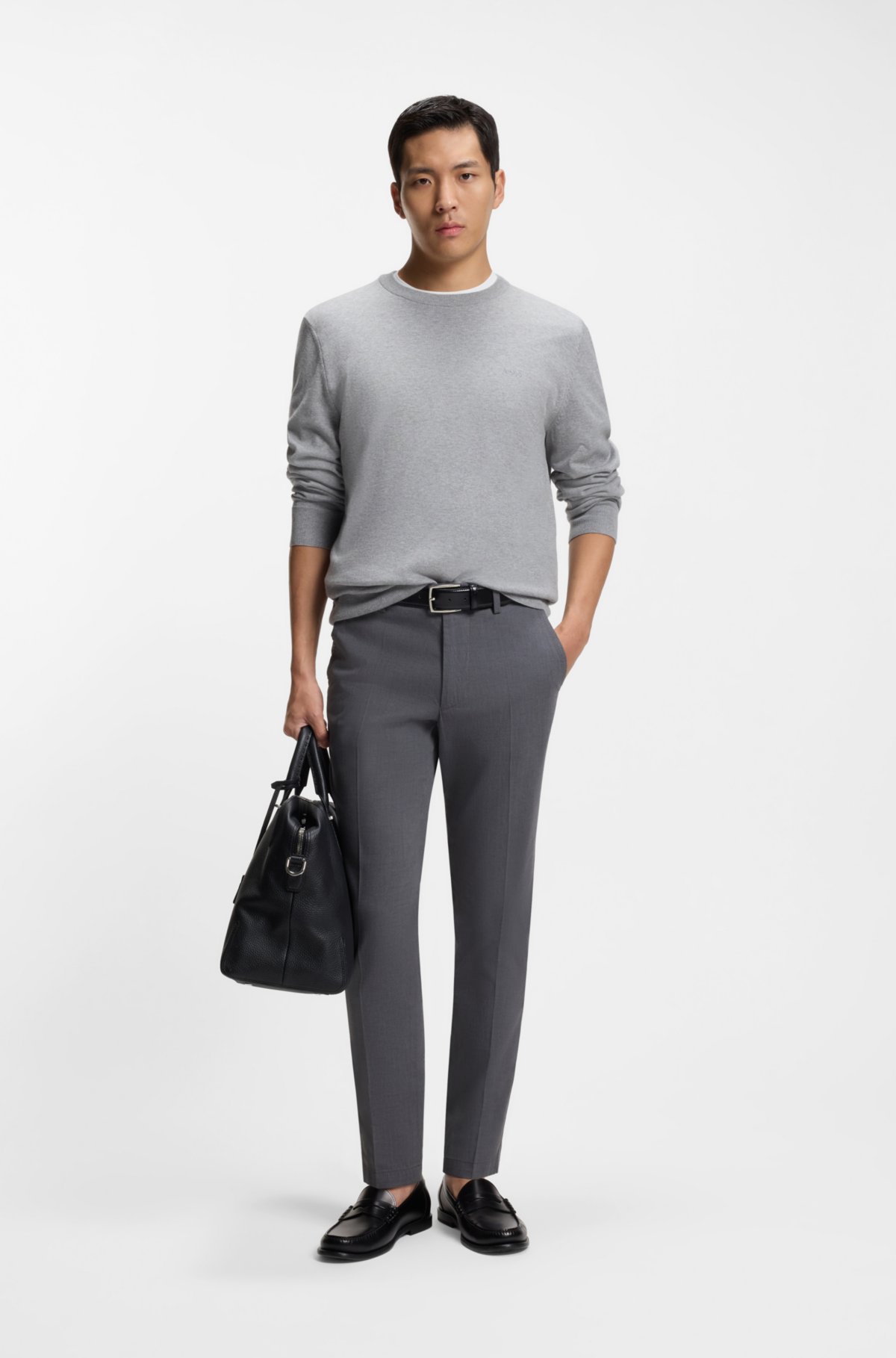 Pantaloni aderenti in cotone elastico a trama dobby