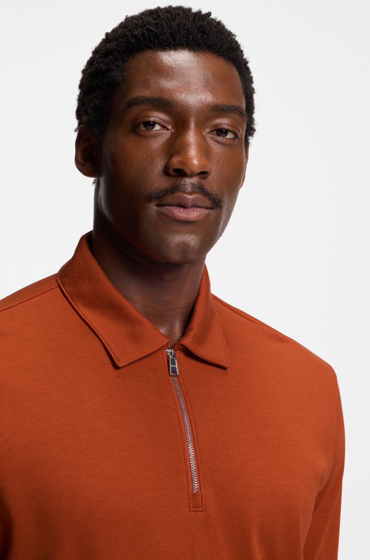 Maglia polo in piqué con collo a zip