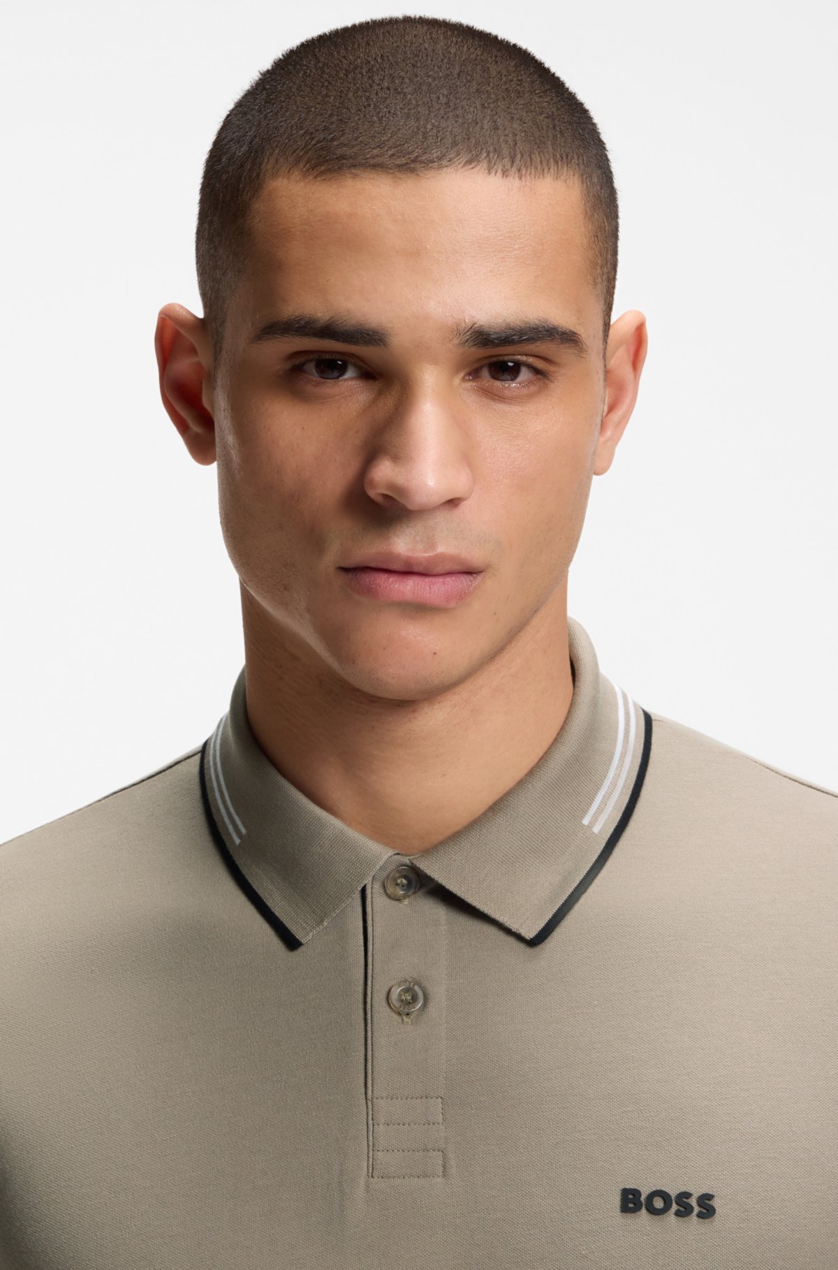 Maglietta polo aderente in cotone elasticizzato con marchio e righe