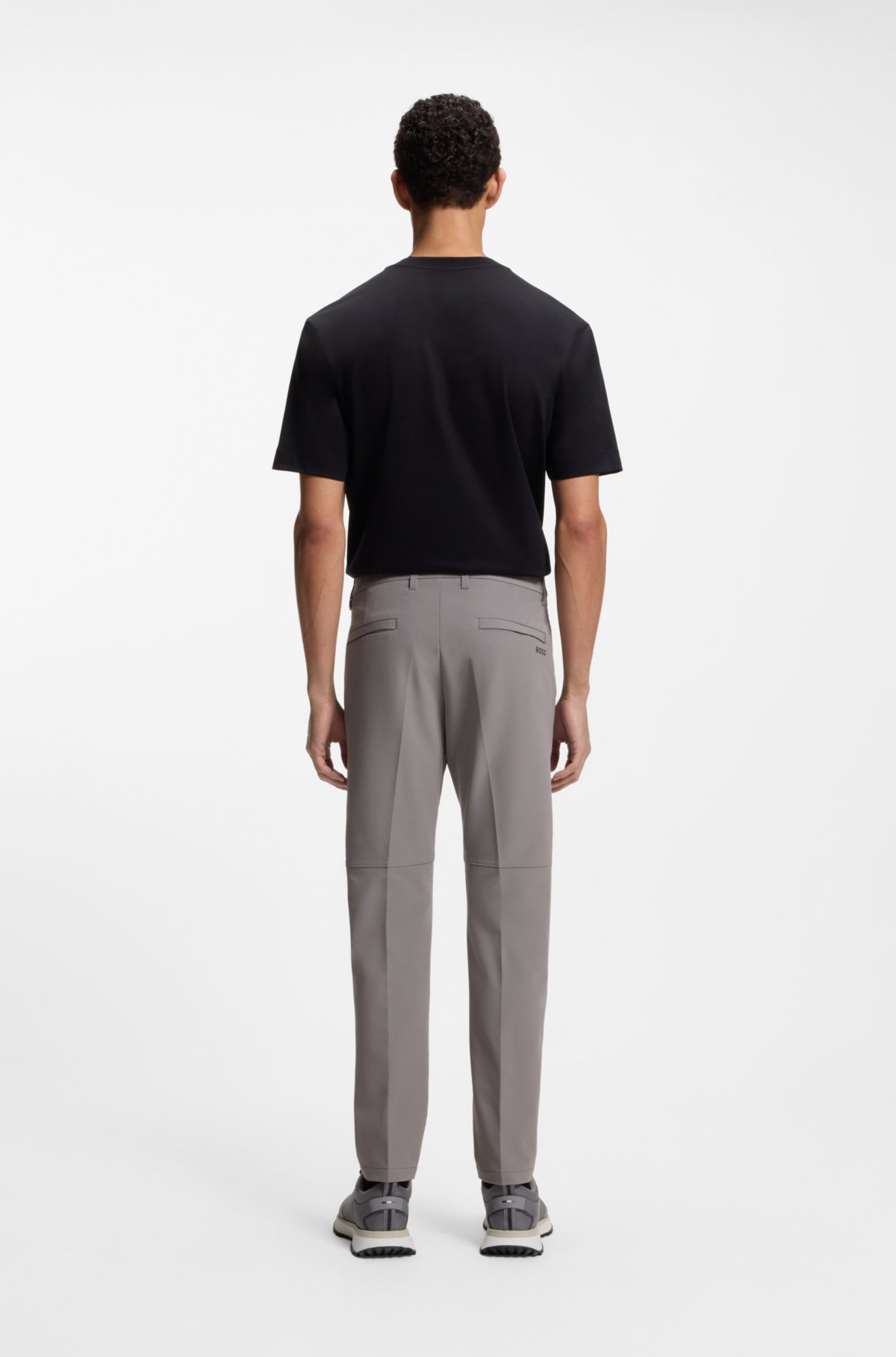 Pantaloni a vestibilità aderente in tessuto elastico idrorepellente