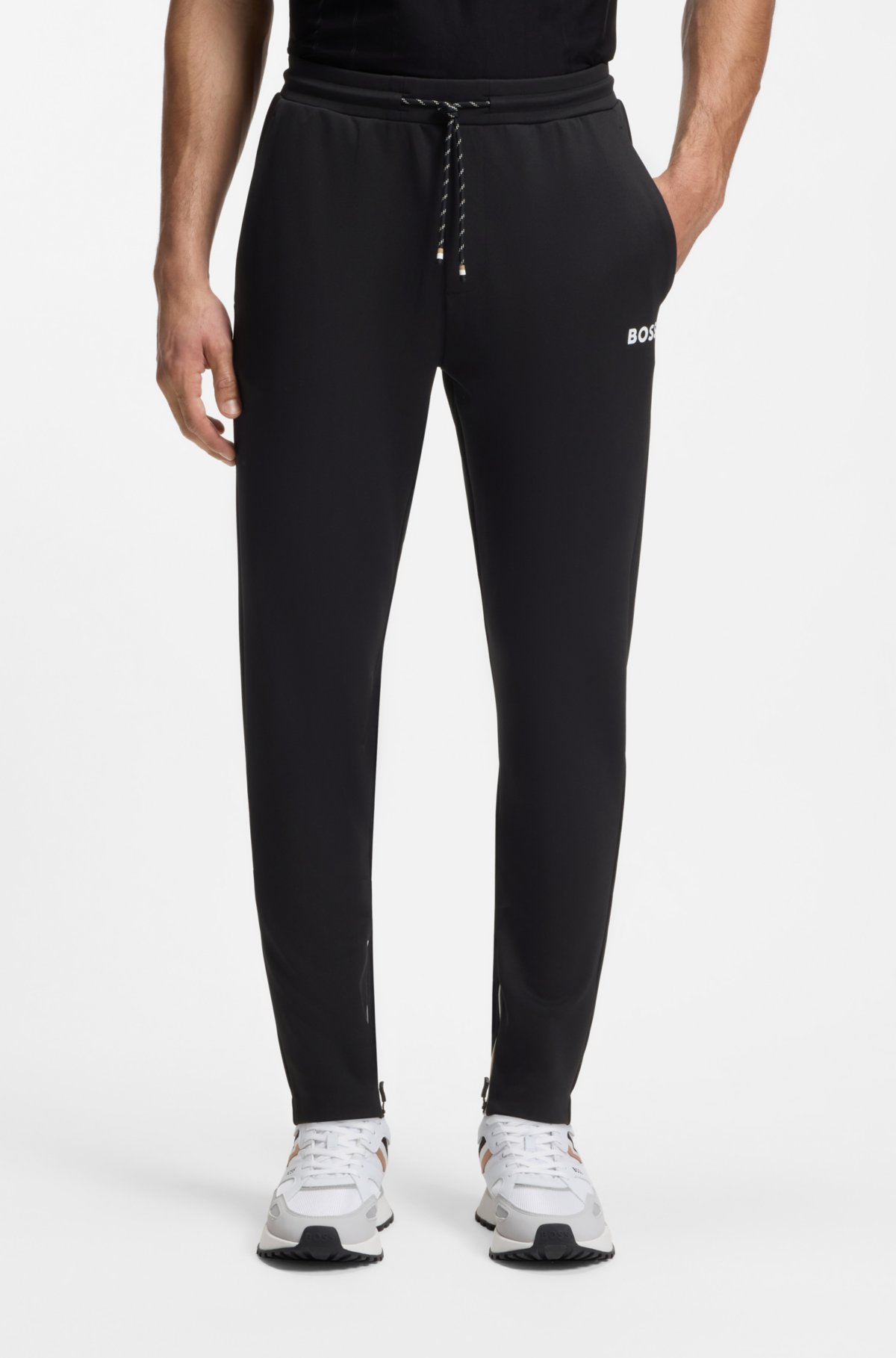 Pantaloni per tuta in gabardine elasticizzato con orli a cerniera