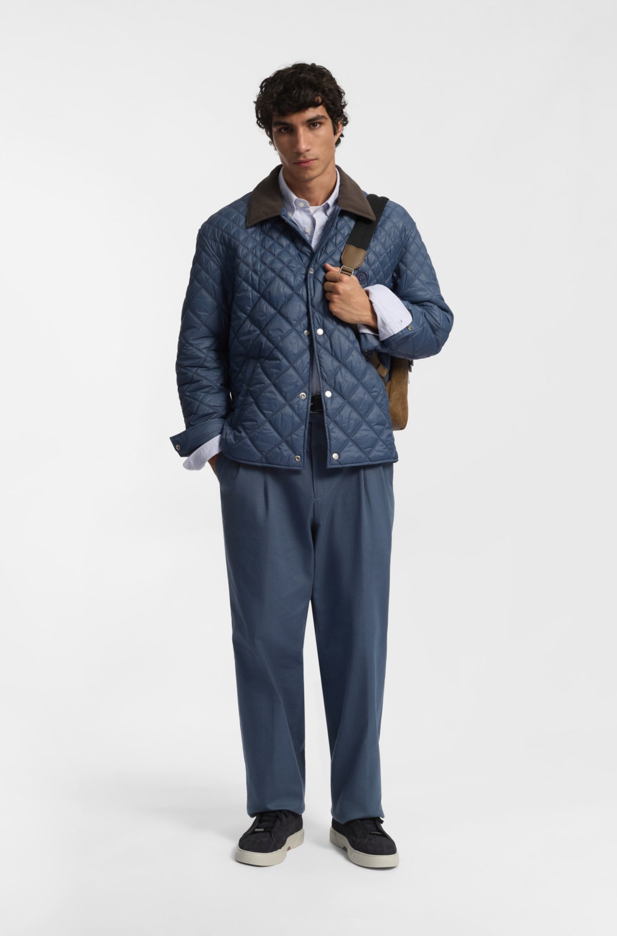 Pantaloni a taglio arrotondato in twill di cotone elasticizzato