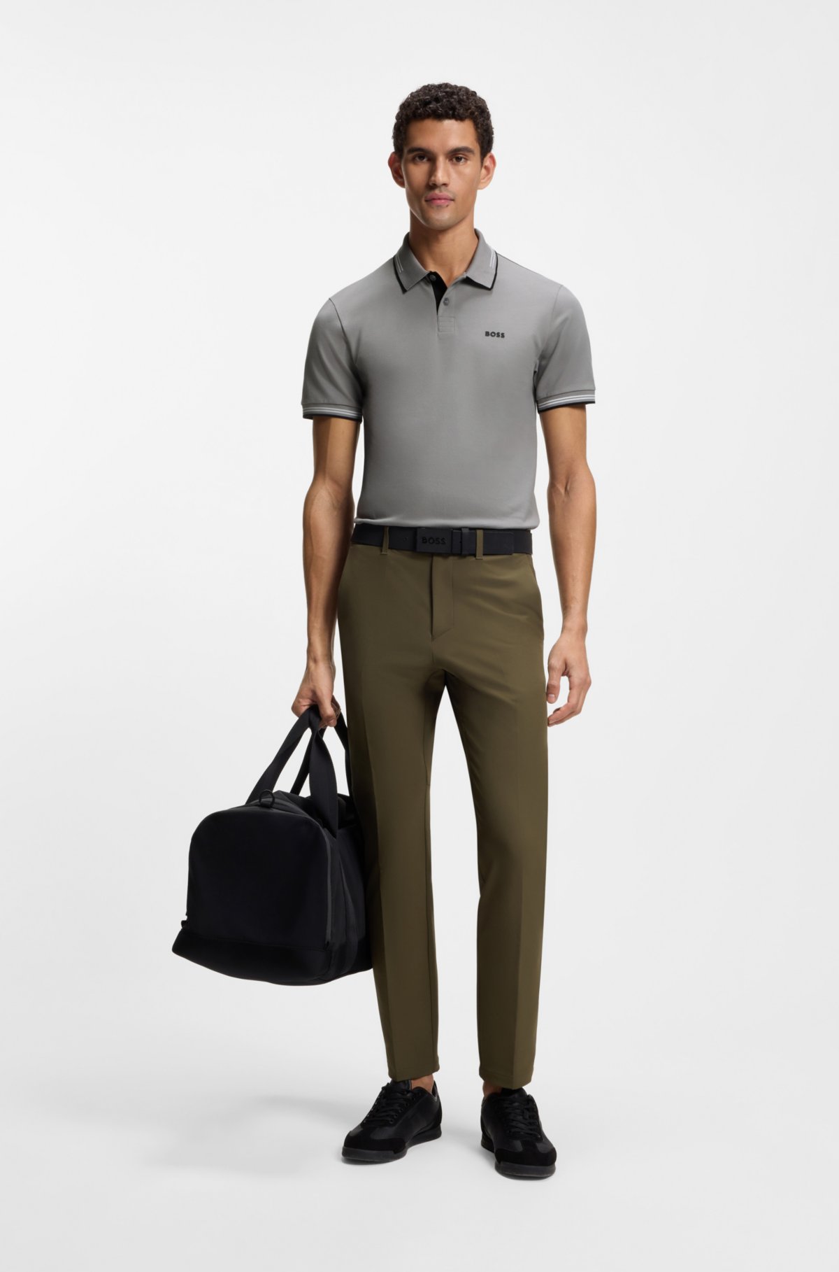 Maglietta polo aderente in cotone elastico con marchio e righe