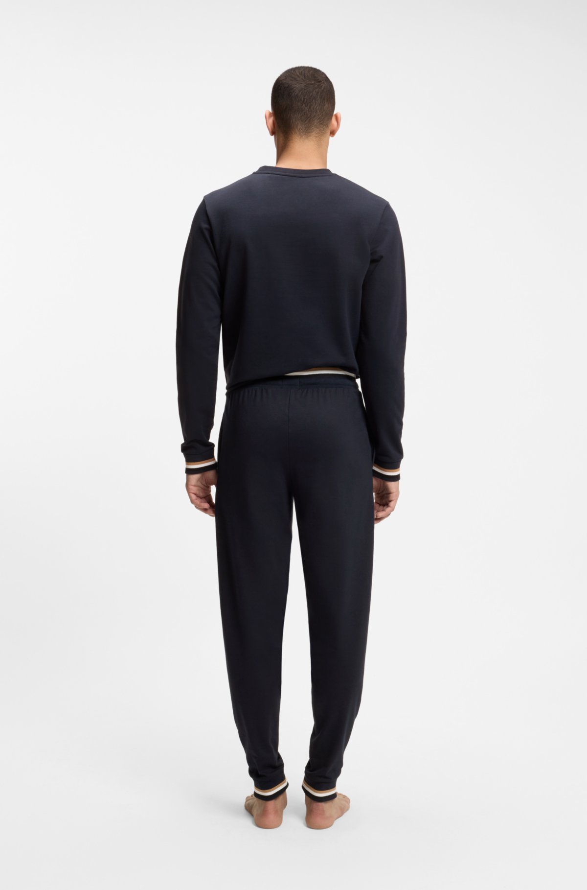 Pantaloni in cotone-terry con strisce firmate e logo