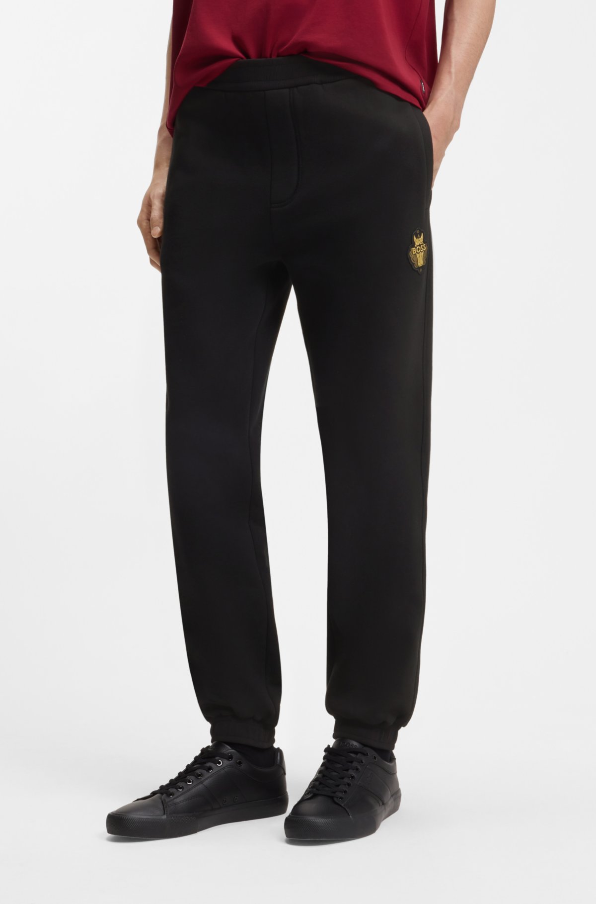 Pantaloni in felpa di cotone con logo artwork dell'Anno del Cavallo