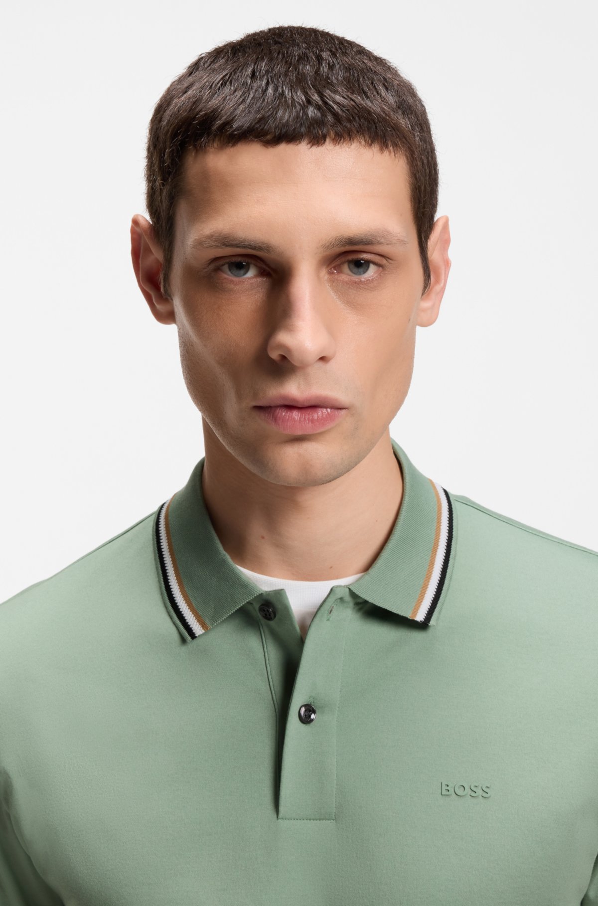Maglietta polo aderente con colletto a righe in cotone con logo