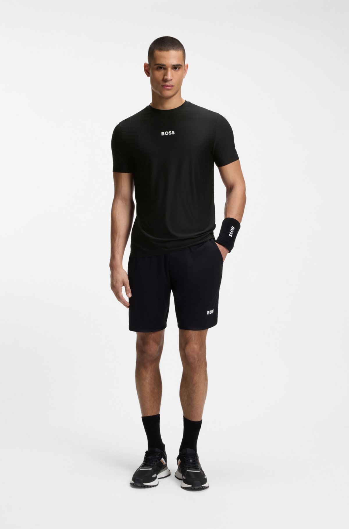 T-shirt aderente in tessuto jacquard con logo e righe