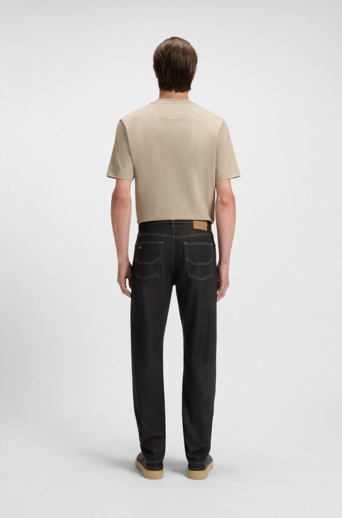 Jeans BOSS x ASTON MARTIN con overdye in alluminio