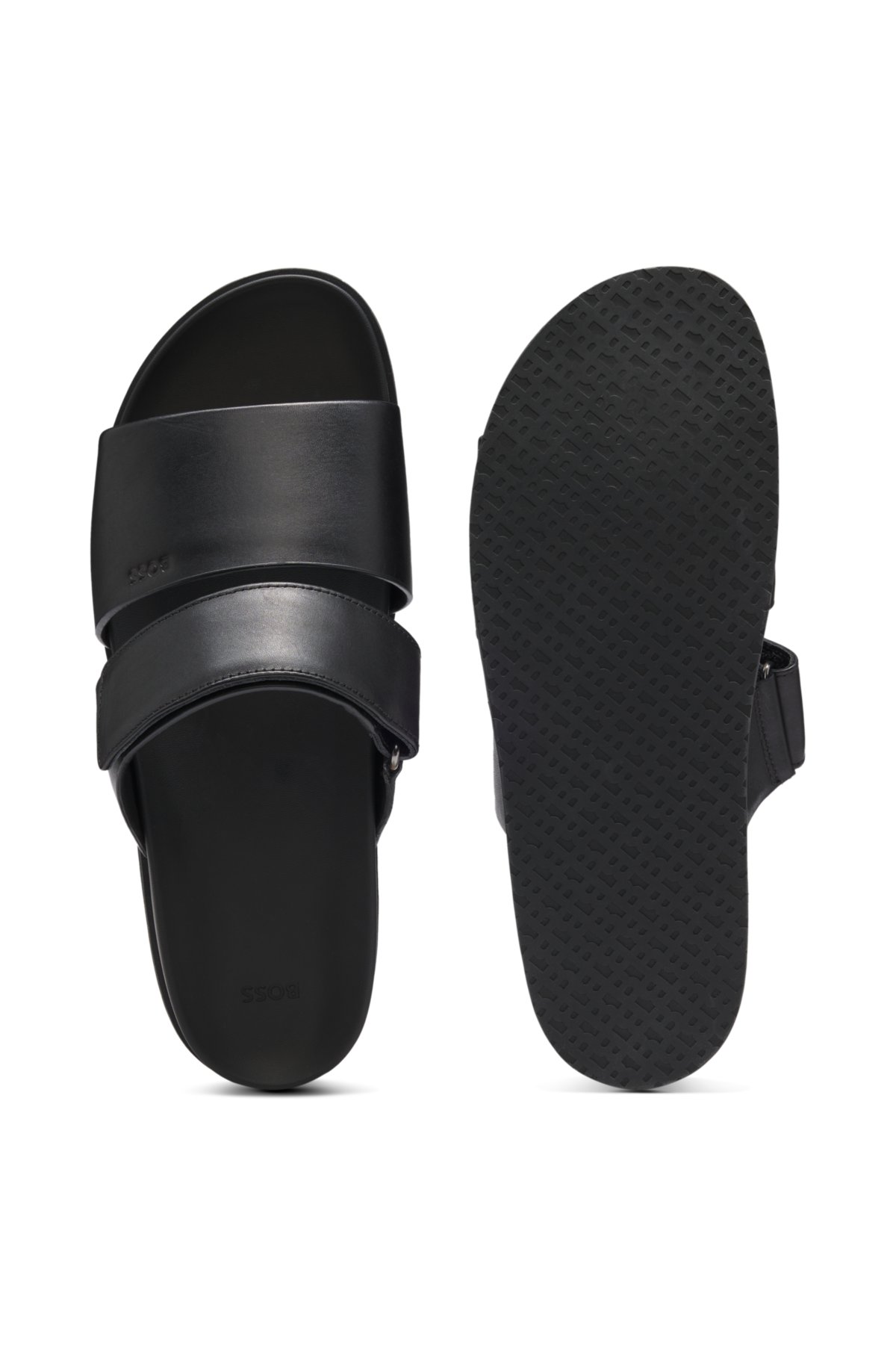 Pantofole in pelle con cinturino a rullo