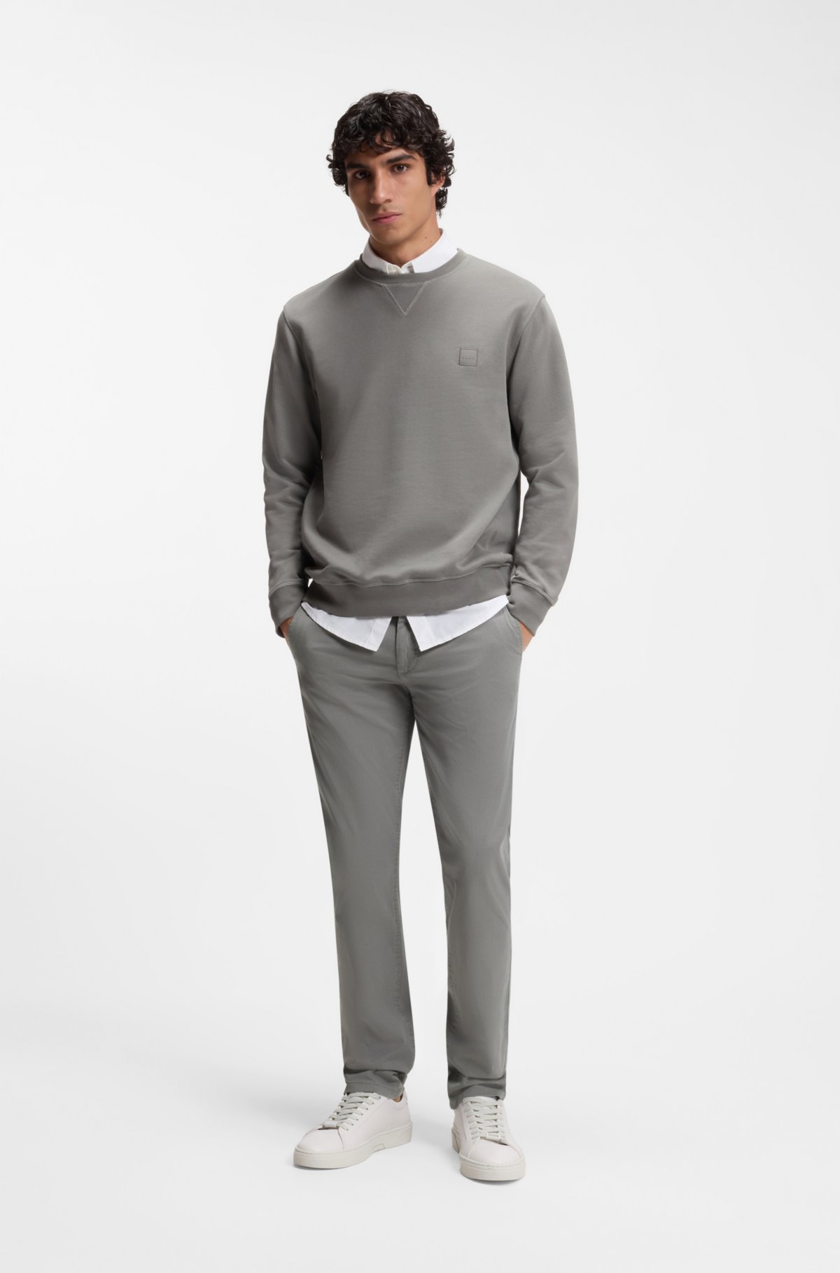 Chinos aderenti in twill di cotone elastico stampato