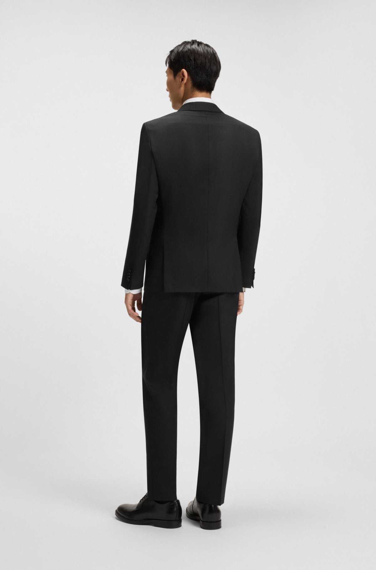 Suit a taglio slim con microdisegno in lana elastica