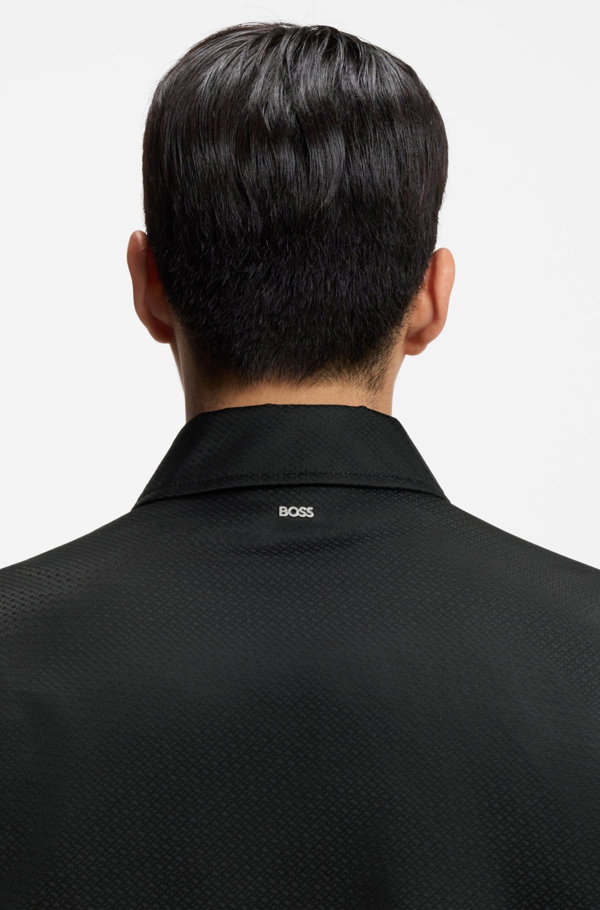 Giubbotto con micro-monogramma e finitura idrorepellente