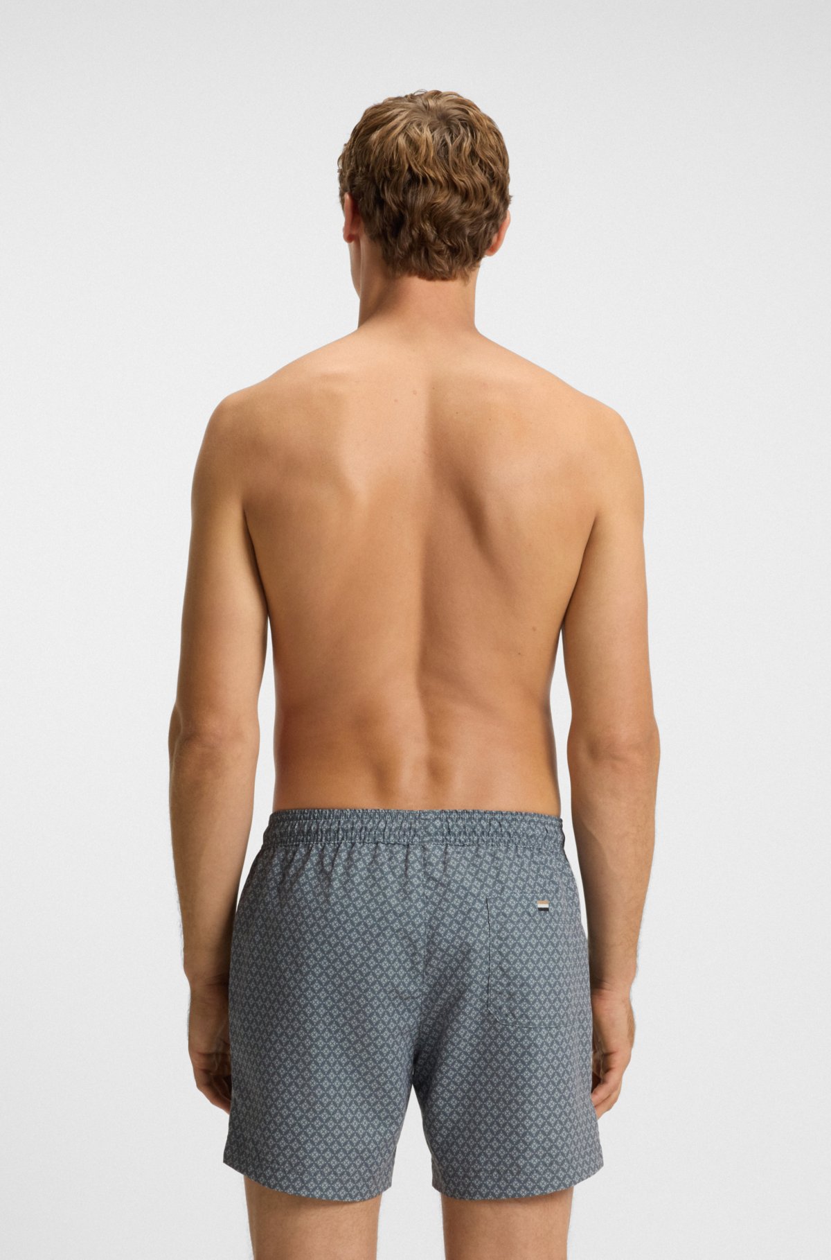Bermuda da bagno con stampa micro e patch logo