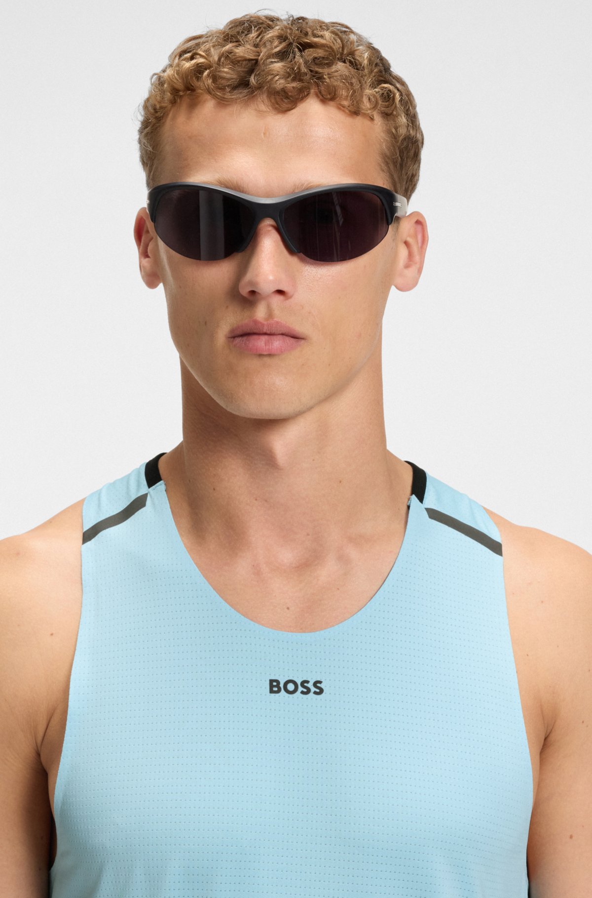Top in maglia in tessuto tecnico con dettagli riflettenti decorativi